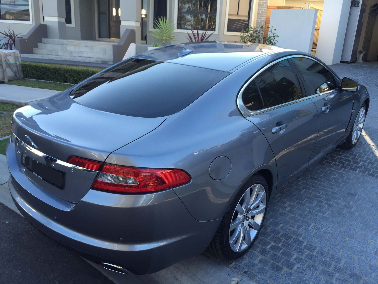 car tinting a luxury car rear view