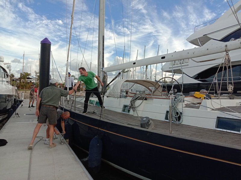 Two People Checking the Status of Repair — Local Marine Repair Experts in Coomera, QLD