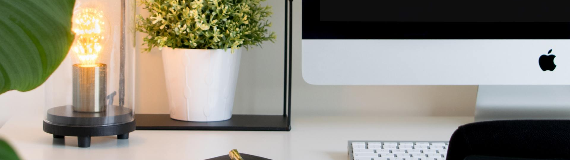 Desk With Plans and Edison Bulb