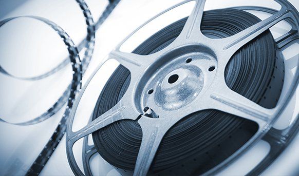 Reel Of 8mm Motion Picture - Video & Photo Copying in Mackay, QLD Reel Of 8mm Motion Picture - Video & Photo Copying in Mackay, QLD