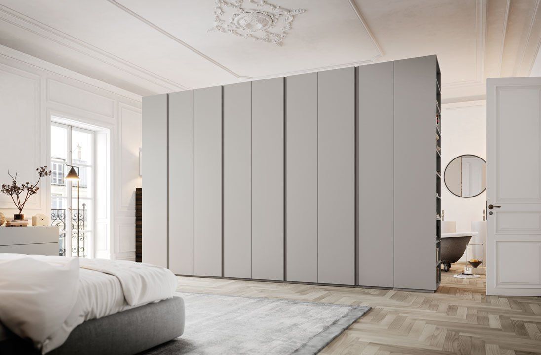 Built in wardrobe with handle-less grey lacquered door