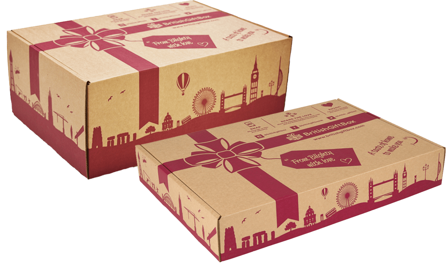 two cardboard boxes with a city skyline on them