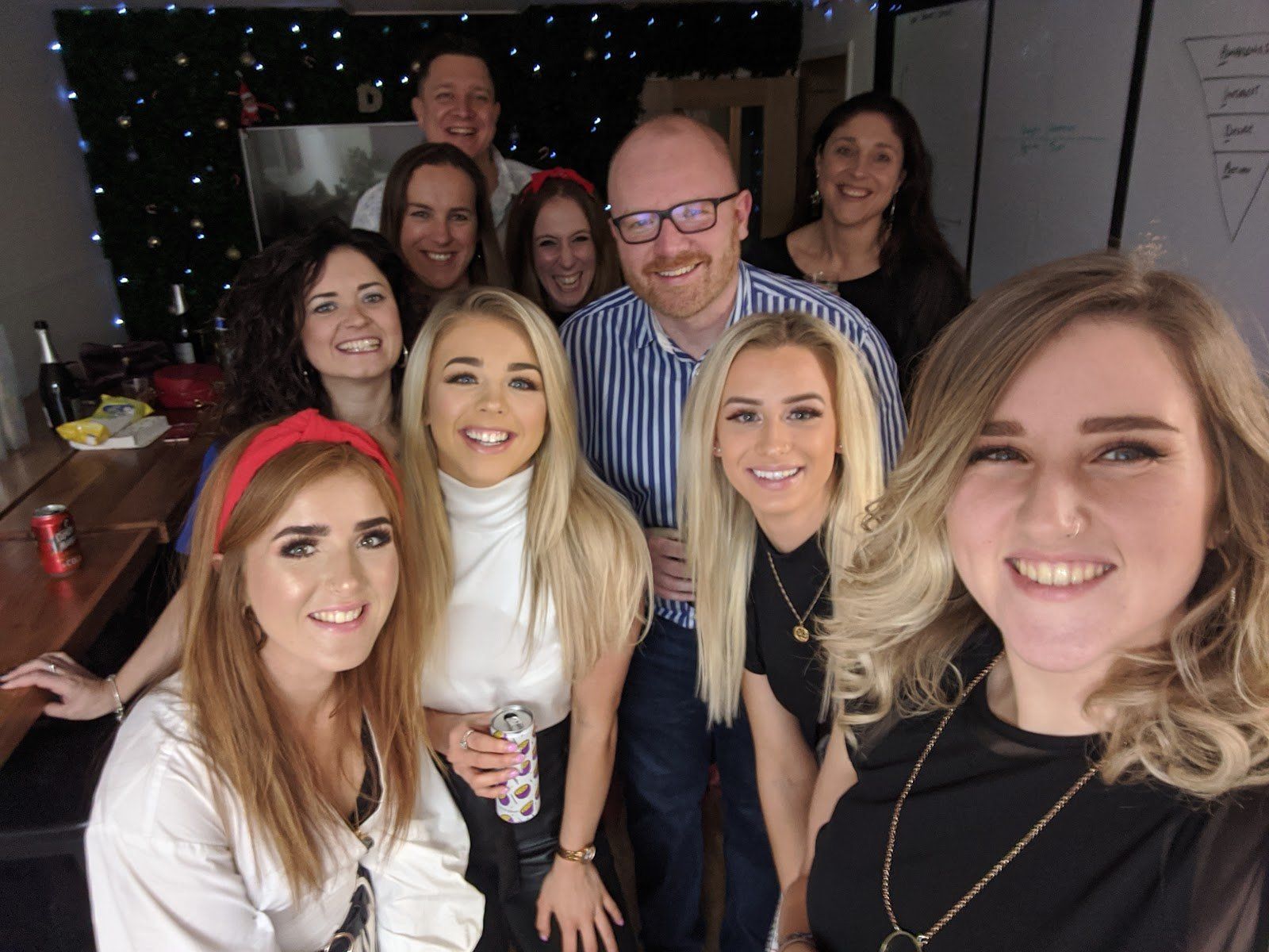 A group of people are posing for a picture together.