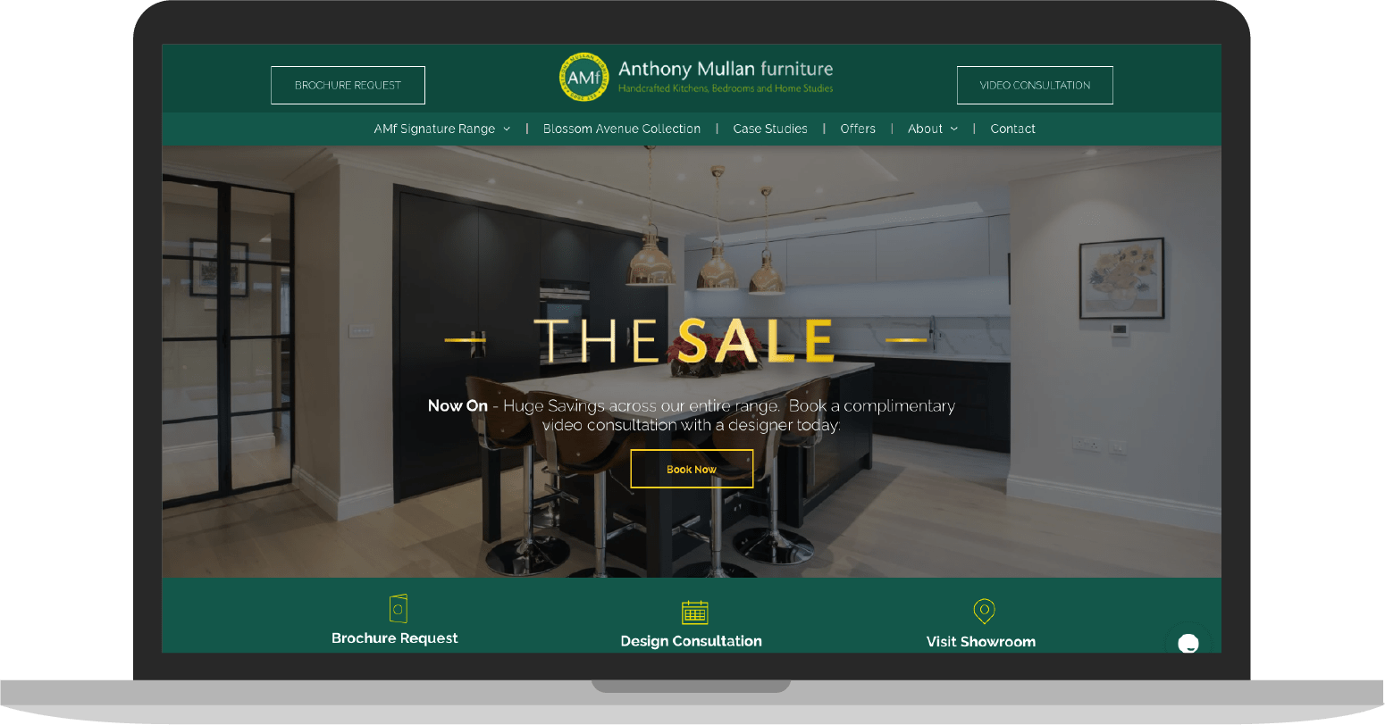 A laptop computer is open to a website that says `` the sale ''.