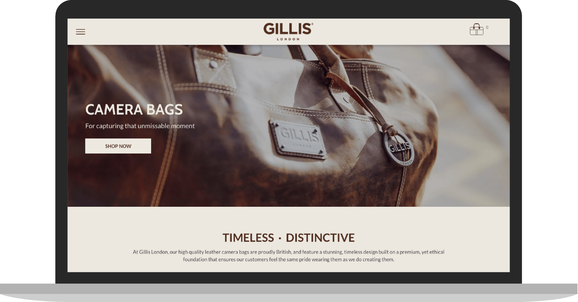 A laptop is open to a website for camera bags.