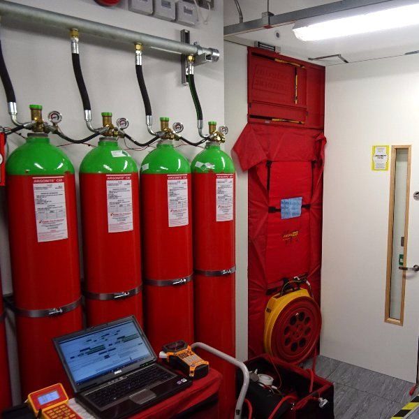 Integrity Testing MYFire, Integrity Testing, Room Sealing, Fire Stopping, Air Sealing, Fire Suppression System, Fire Suppression Systems, Fire Suppression, Gaseous Fire Suppression, Fire Alarms, Argon, IG001, Argonite, IG55, Nitrogen, IG100, Inergen, IG541, FM200, CO2, Novec, 1230, Cylinders, Gas, Fire Protection, Fire Protection Systems, Room Design, System Design, Commissioning, Servicing, Maintenance, Installation, Cylinder Installation, Cylinder Replacement, British Standard, EN 15004, ISO 14520, BS 7273, BS 5839, Comms Room, Data Centre, Data Center, Server Room, HV Switch Room, LV Switch Room, Switch Room, Experienced, Engineer, Cheap, Competitive, London, England, Wales, Scotland,
