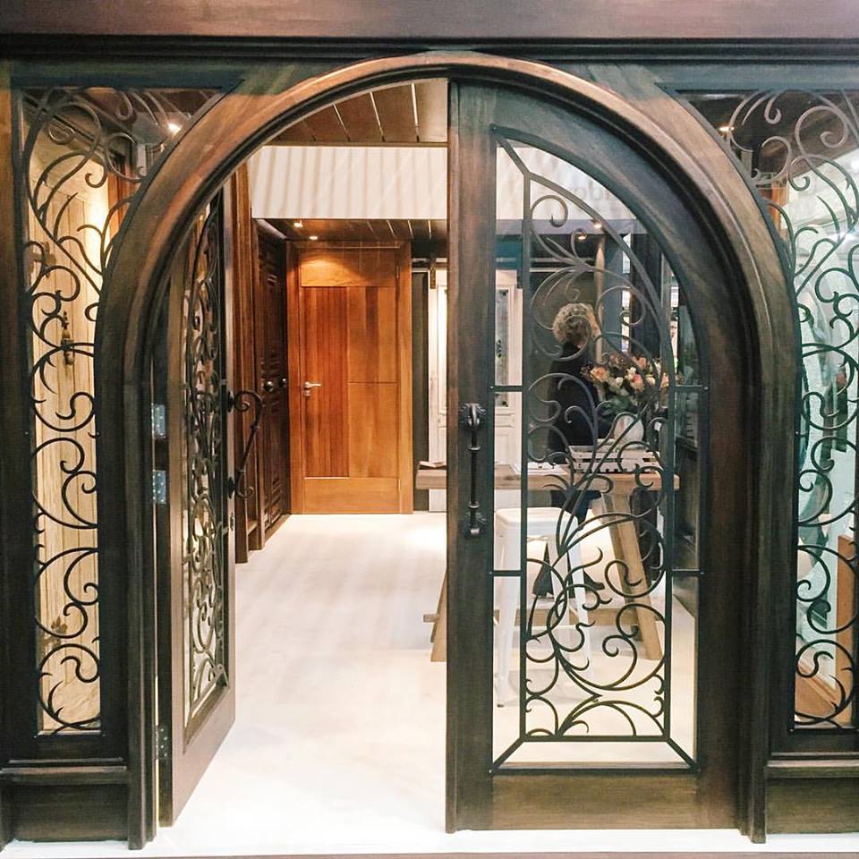 Grapedoor Custom made glass door with decorative steel design