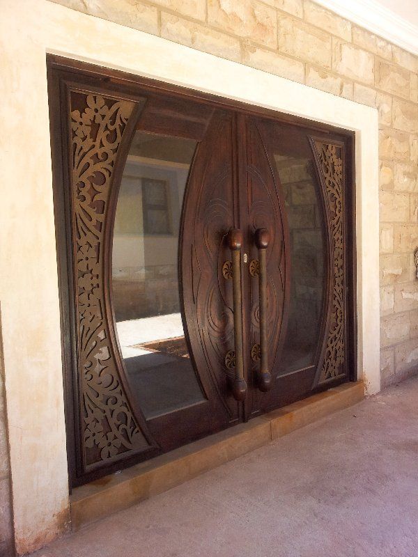 Grapedoor Custom made glass door with decorative steel Brabus design