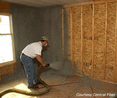 Cellulose Insulation — Staff Installing Cellulose Insulation in Hot Springs, AR Cellulose Insulation — Staff Installing Cellulose Insulation in Hot Springs, AR