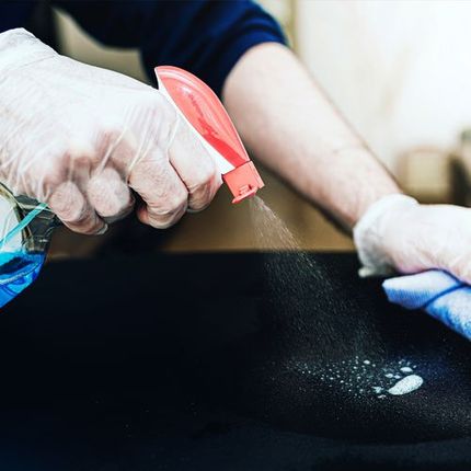 Disinfectant Spray to Clean Table Surface — Beaver Falls, PA — Cline Cleaning & Restoration Disinfectant Spray to Clean Table Surface — Beaver Falls, PA — Cline Cleaning & Restoration