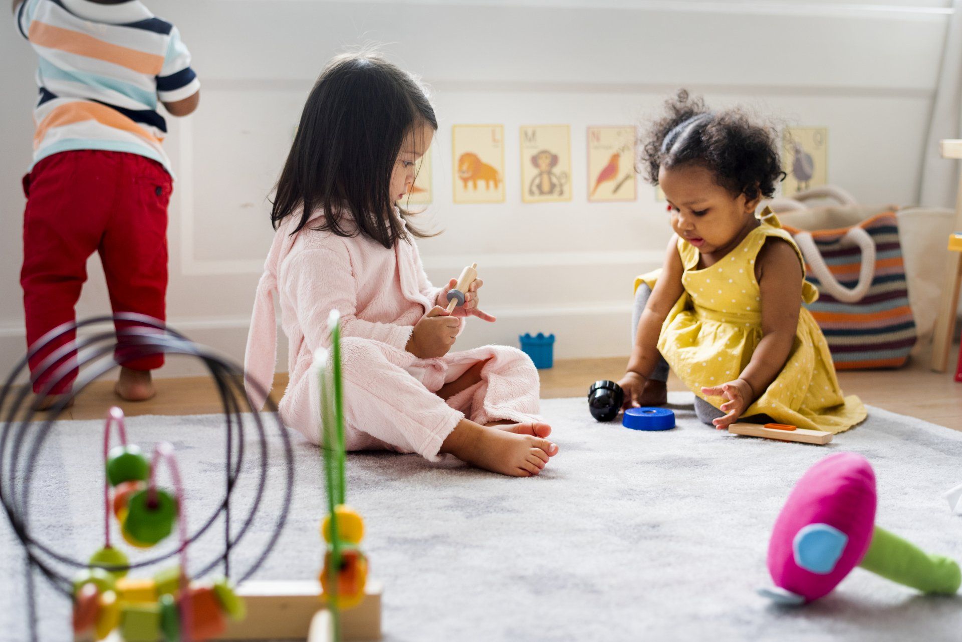 Toddler Playing with Building Blocks — Baton Rouge, LA — A Lil One’s Learning Center