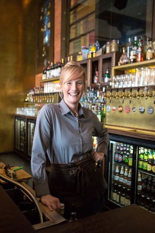 woman smiling while at work