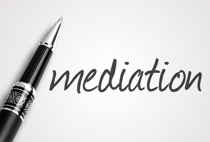 Pen beside the word