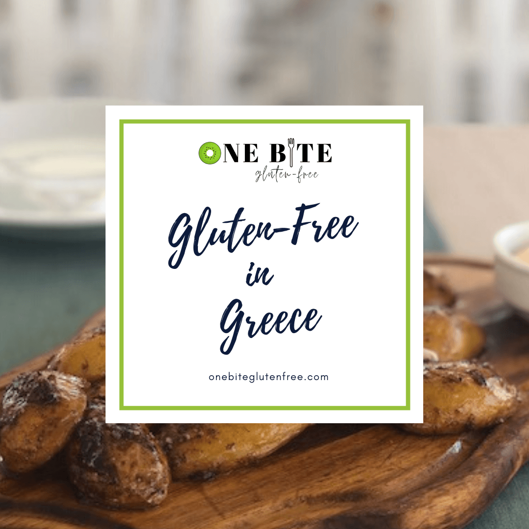 A wooden cutting board with a sign that says gluten free in greece