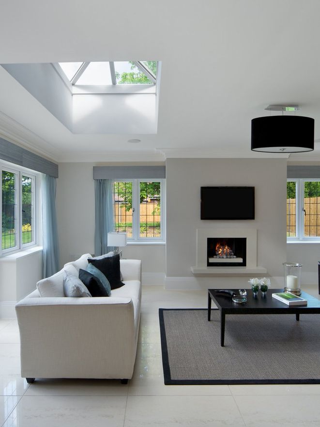 A beautiful, spacious and bright sitting room in an expensive new home.