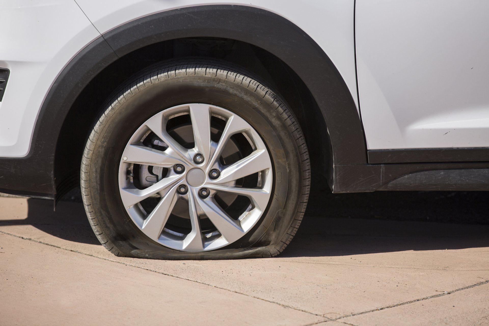 Car with Flat Tire — Cheyenne, WY — Big Al’s Towing & Recovery