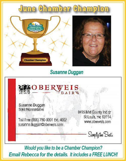 June Chamber Champion: Susanne Duggan, with a trophy, logo, and business card for Oberweis Dairy.