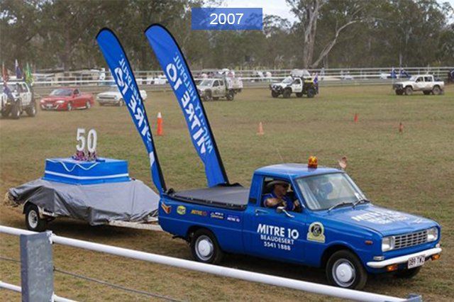 Mitre 10 blue car