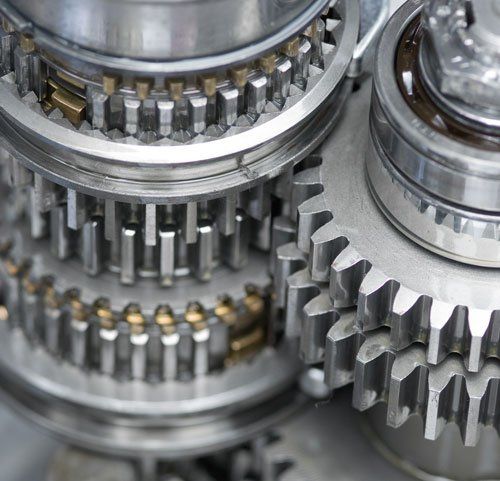 una serie di ingranaggi metallici