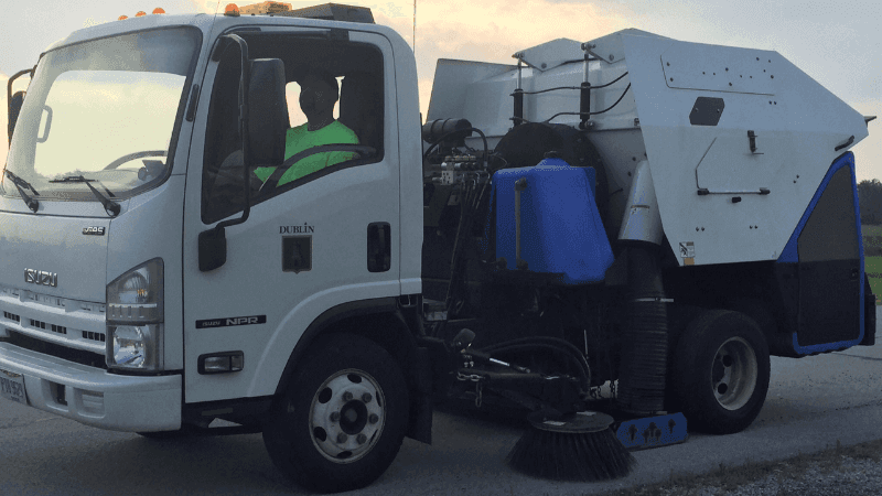 Parking lot sweeping on a street in Port Clinton, Ohio