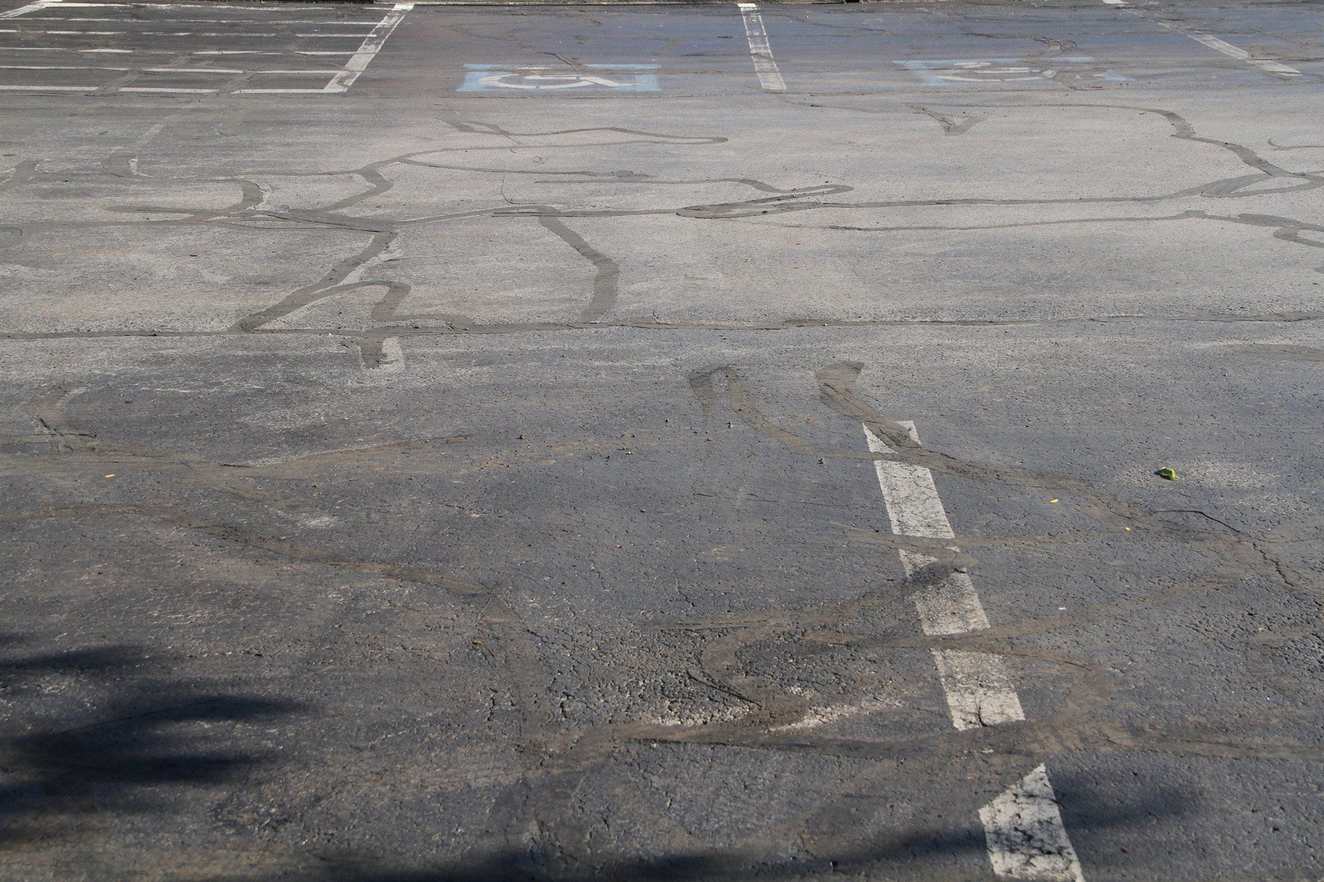 Parking lot with faded striping