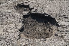 Pothole before being repaired by Dublin CPS, Inc.