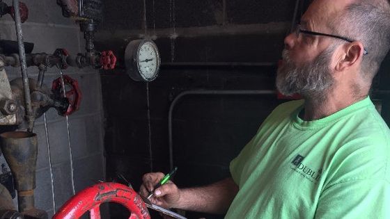 Dublin CPS, Inc. tech performing an inspection