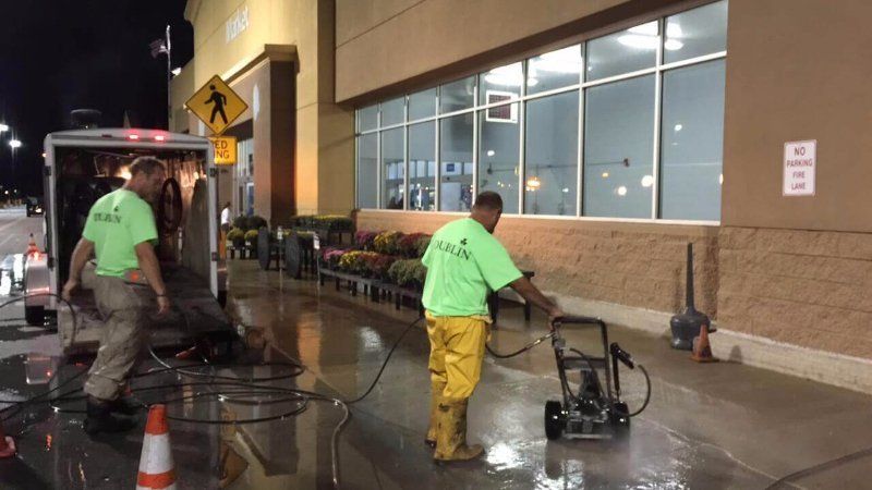 Power washing crew from Dublin CPS, Inc. cleaning building exterior in Northwest Ohio.