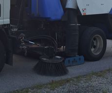 Parking Lot Sweeper cleaning commercial parking lot in Northwest Ohio.