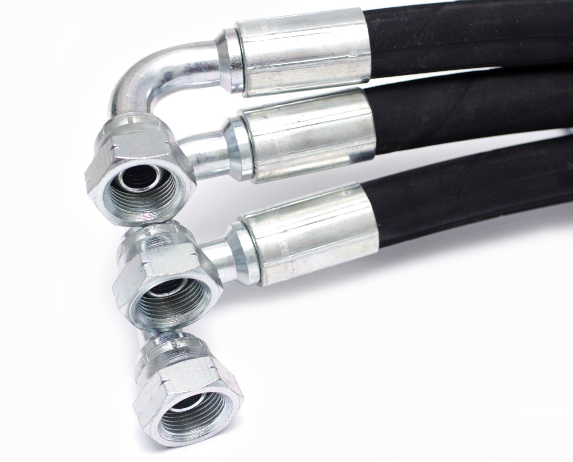 Three black hydraulic hoses with silver metal fittings, showing threaded elbow connectors.