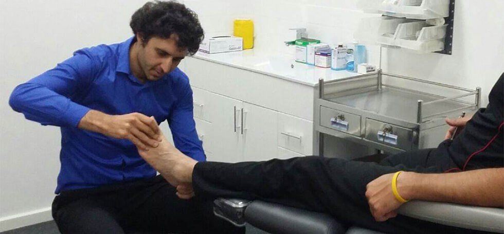 Doctor Looking At Foot - Perth, WA - Centrepod Podiatry