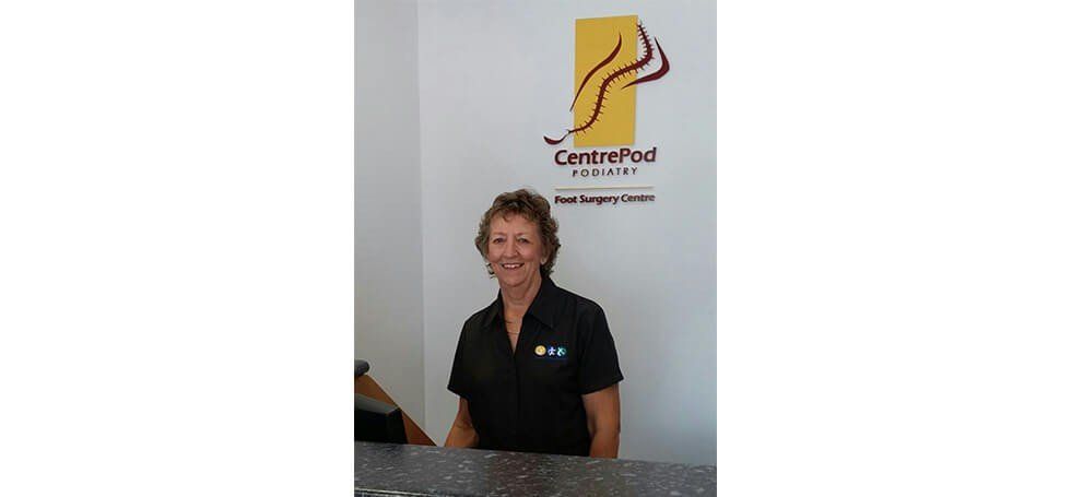 Doctor Standing By Logo - Perth, WA - Centrepod Podiatry