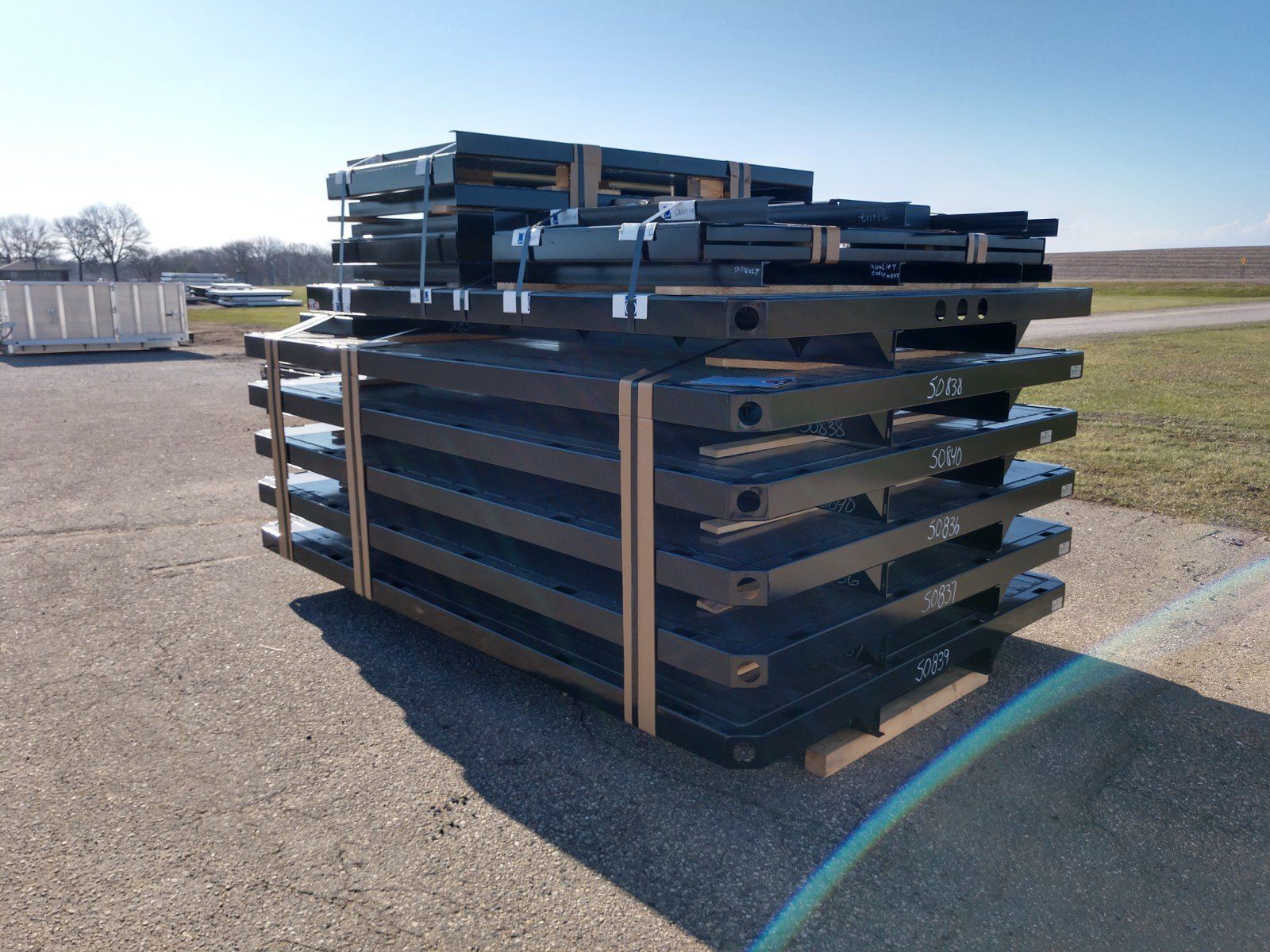 A stack of pallets with the number 33 on them