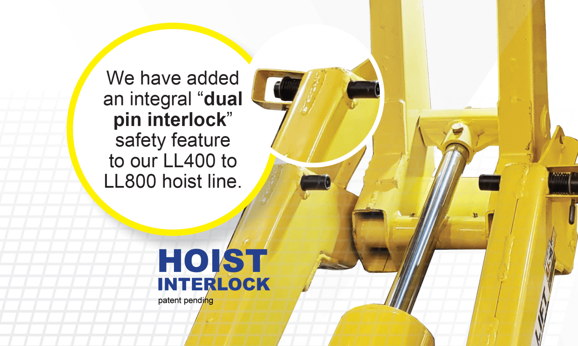 A yellow hoist with the words hoist interlock on it