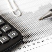 close up of calcualtor and financial Documents