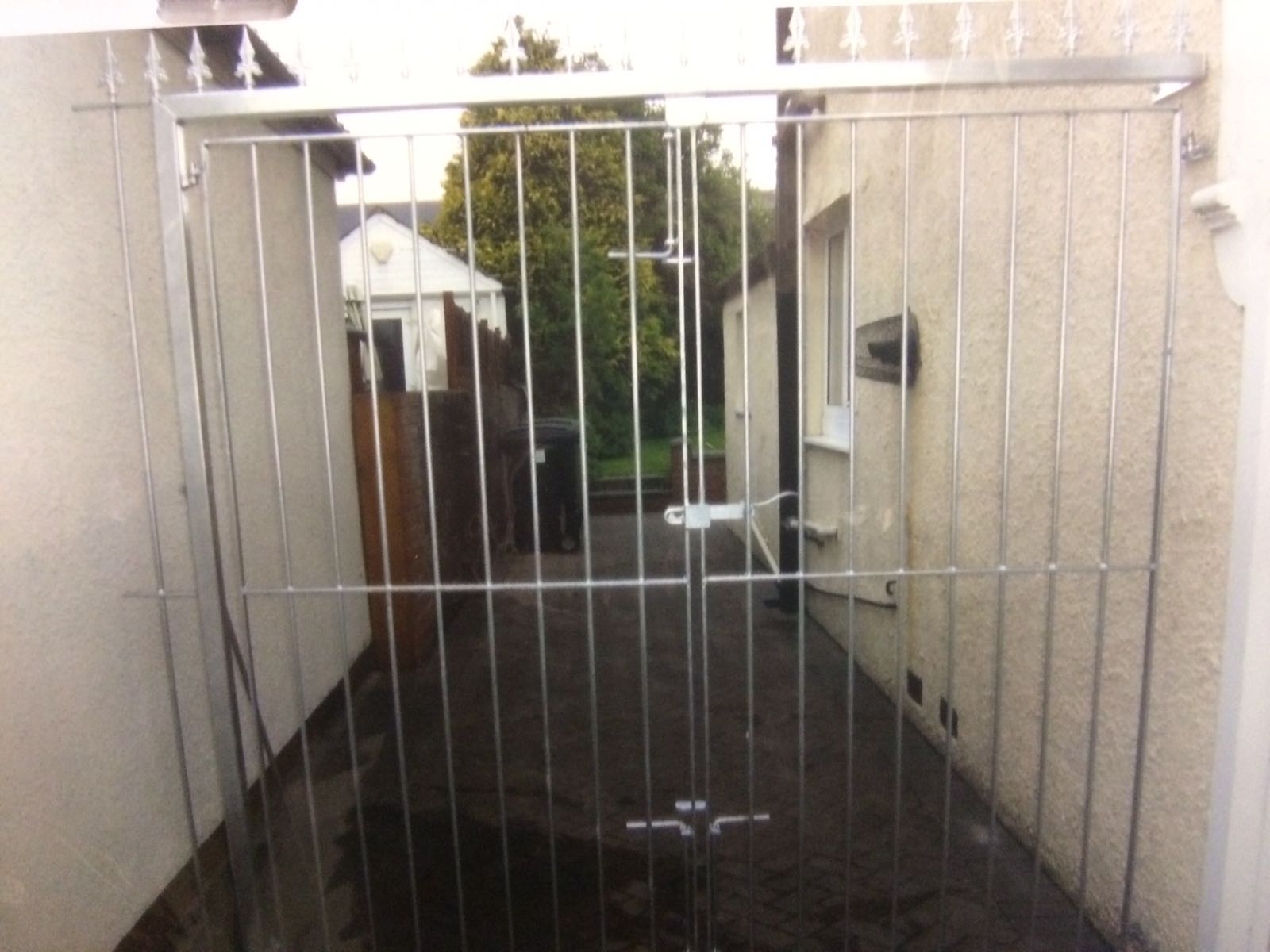 white painted metal gate