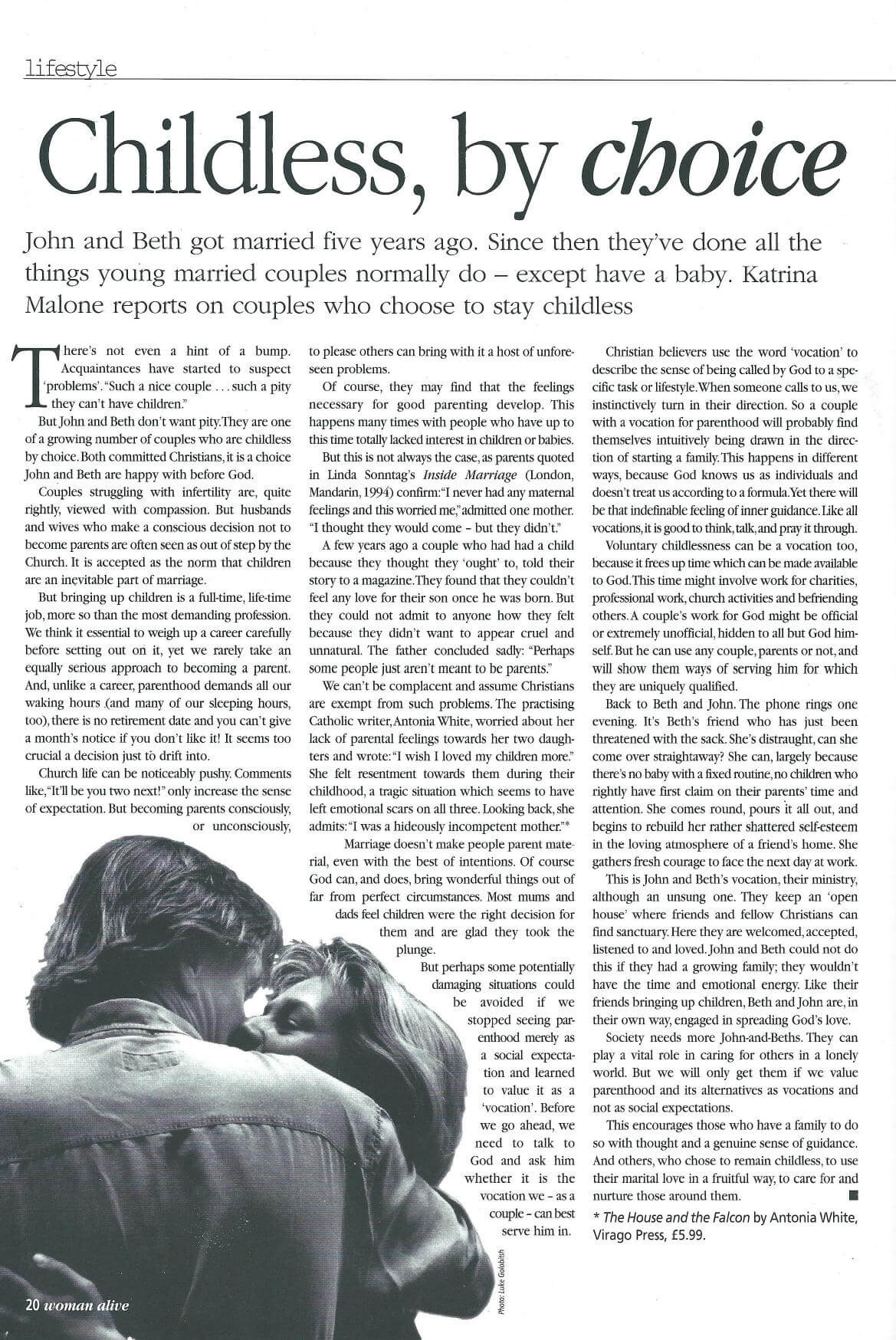 A couple embraces closely in a black-and-white image, positioned below the headline