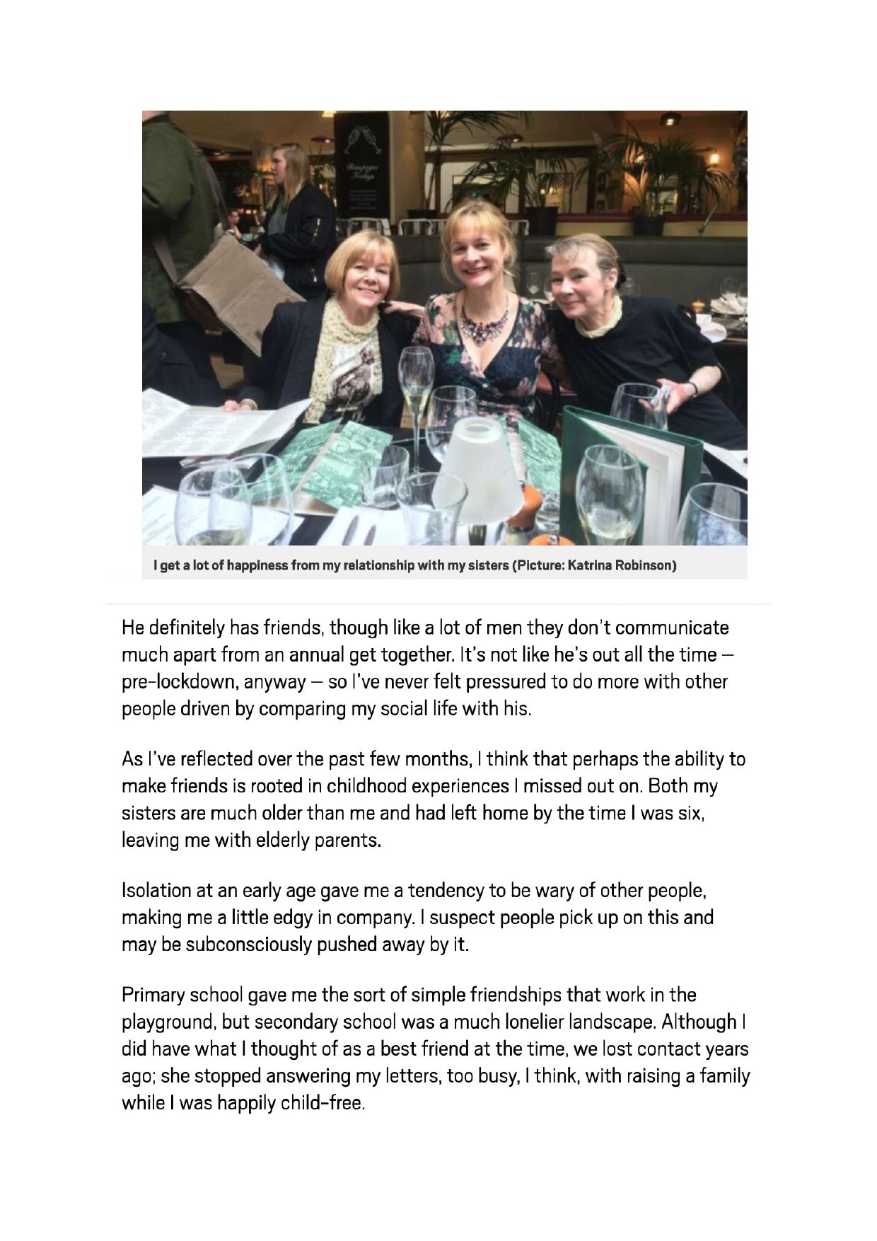 Three people smiling at a restaurant table with glasses, cutlery, and a book, under text discussing social anxiety.