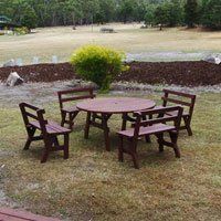 Hideaway Villa Rear Deck with BBQ opens out to garden area with views of Serra Range mountains. Halls Gap Valley Lodges.