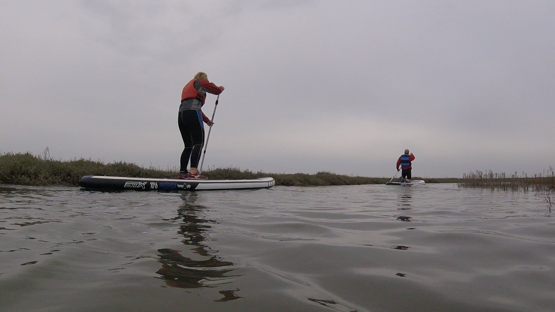 Paddle boarding with Betty in Burnham Overy Staithe on the North Norfolk Coa