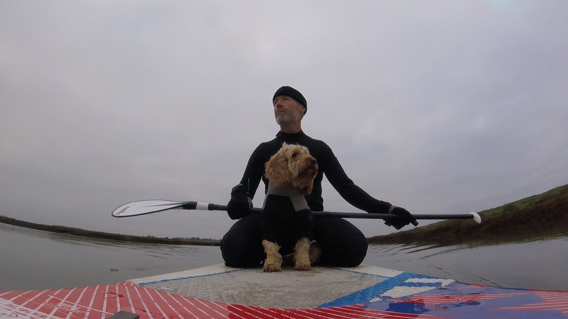 Paddle boarding with Betty in Burnham Overy Staithe on the North Norfolk Coast
