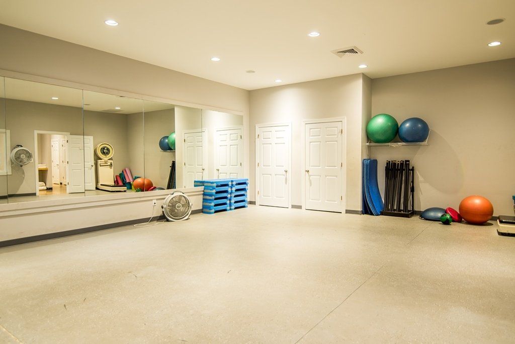 There is a large mirror in the middle of the room.