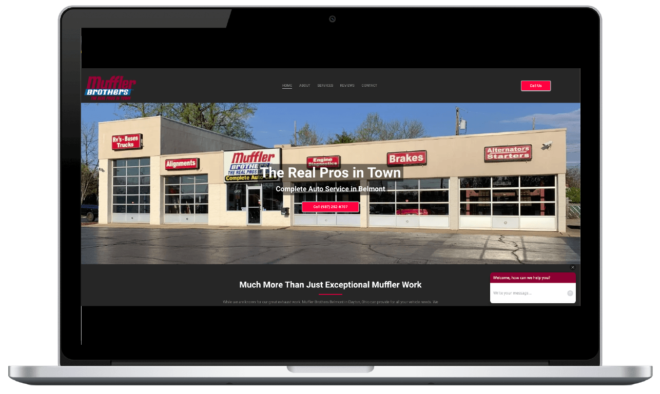 A laptop with a picture of a tire shop on the screen.