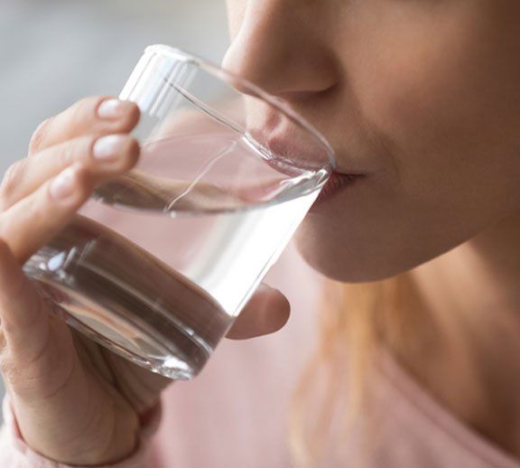 Woman thirsty drinks water - Diabetes Services in Camden North Haven, NSW Woman thirsty drinks water - Diabetes Services in Camden North Haven, NSW