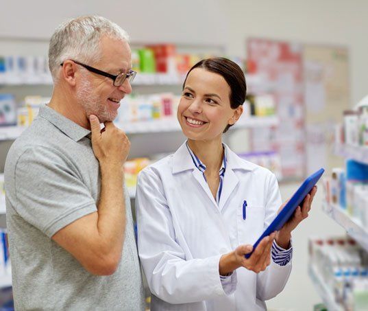 Elderly being assisted by Pharmacist - Dose Administration Aids in Camden North Haven, NSW Elderly being assisted by Pharmacist - Dose Administration Aids in Camden North Haven, NSW