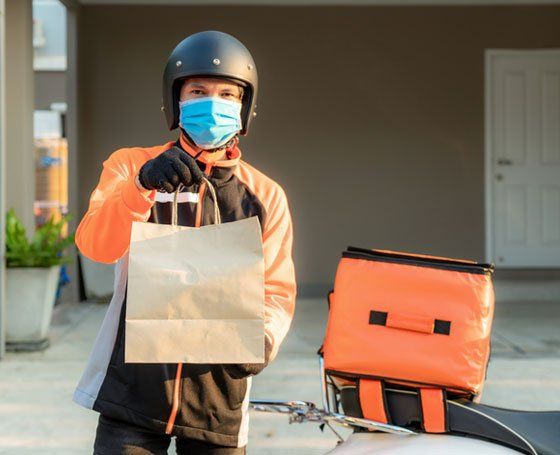 Deliveryman with mask handing bag - Free Home Delivery in Camden North Haven, NSW Deliveryman with mask handing bag - Free Home Delivery in Camden North Haven, NSW