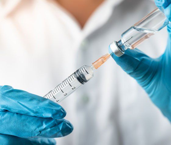 Syringe absorbing liquid for vaccination - Vaccination in Camden North Haven, NSW Syringe absorbing liquid for vaccination - Vaccination in Camden North Haven, NSW