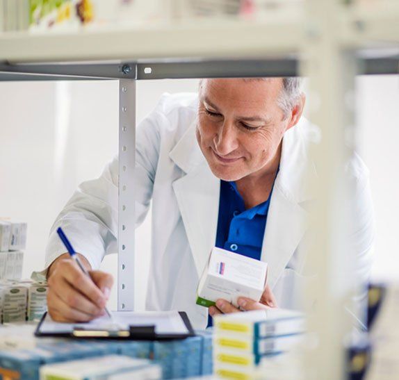 Pharmacist quality assuring the medicine - About Us in North Haven. NSW Pharmacist quality assuring the medicine - About Us in North Haven. NSW