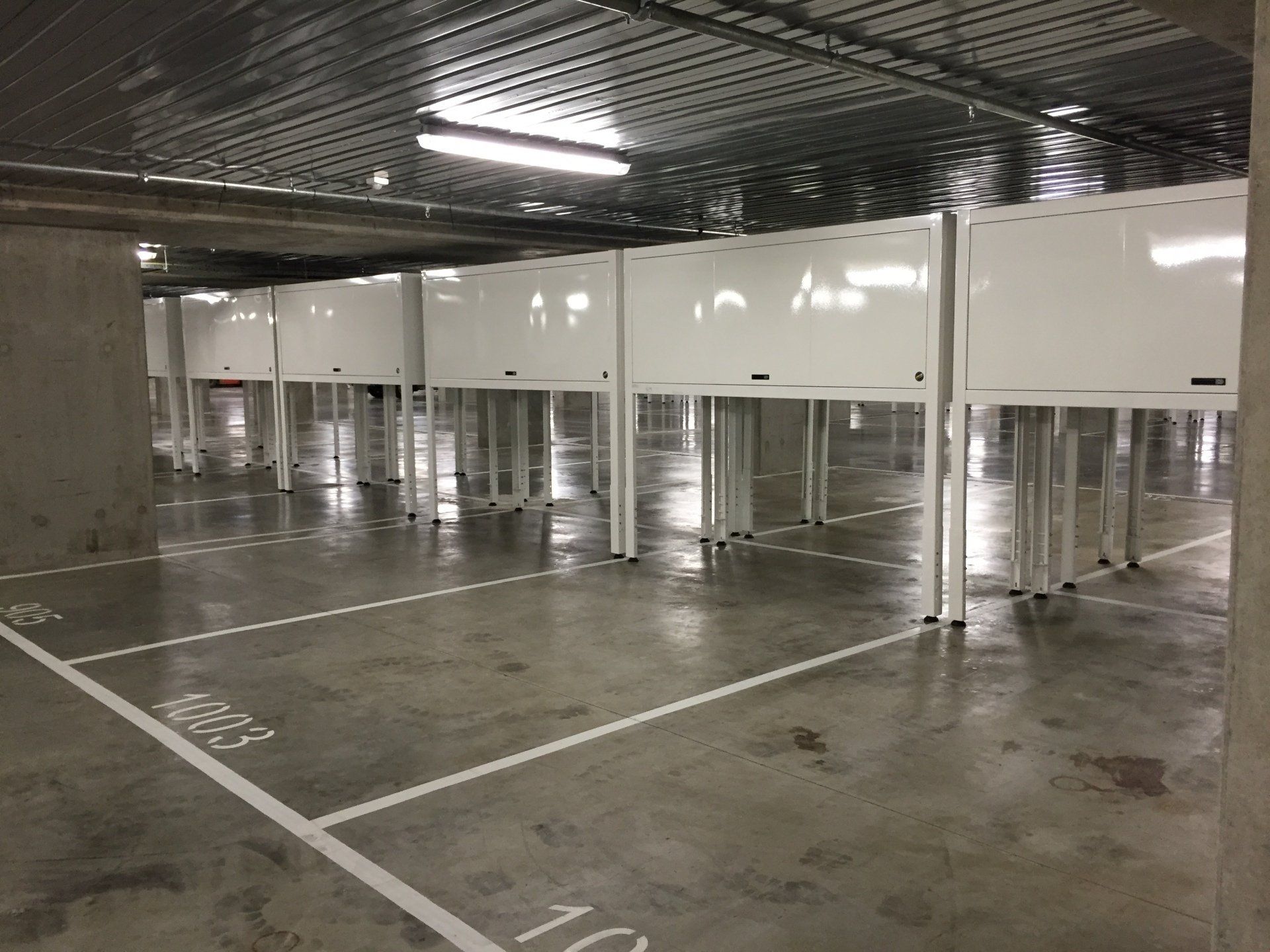 row of over bonnet storage units