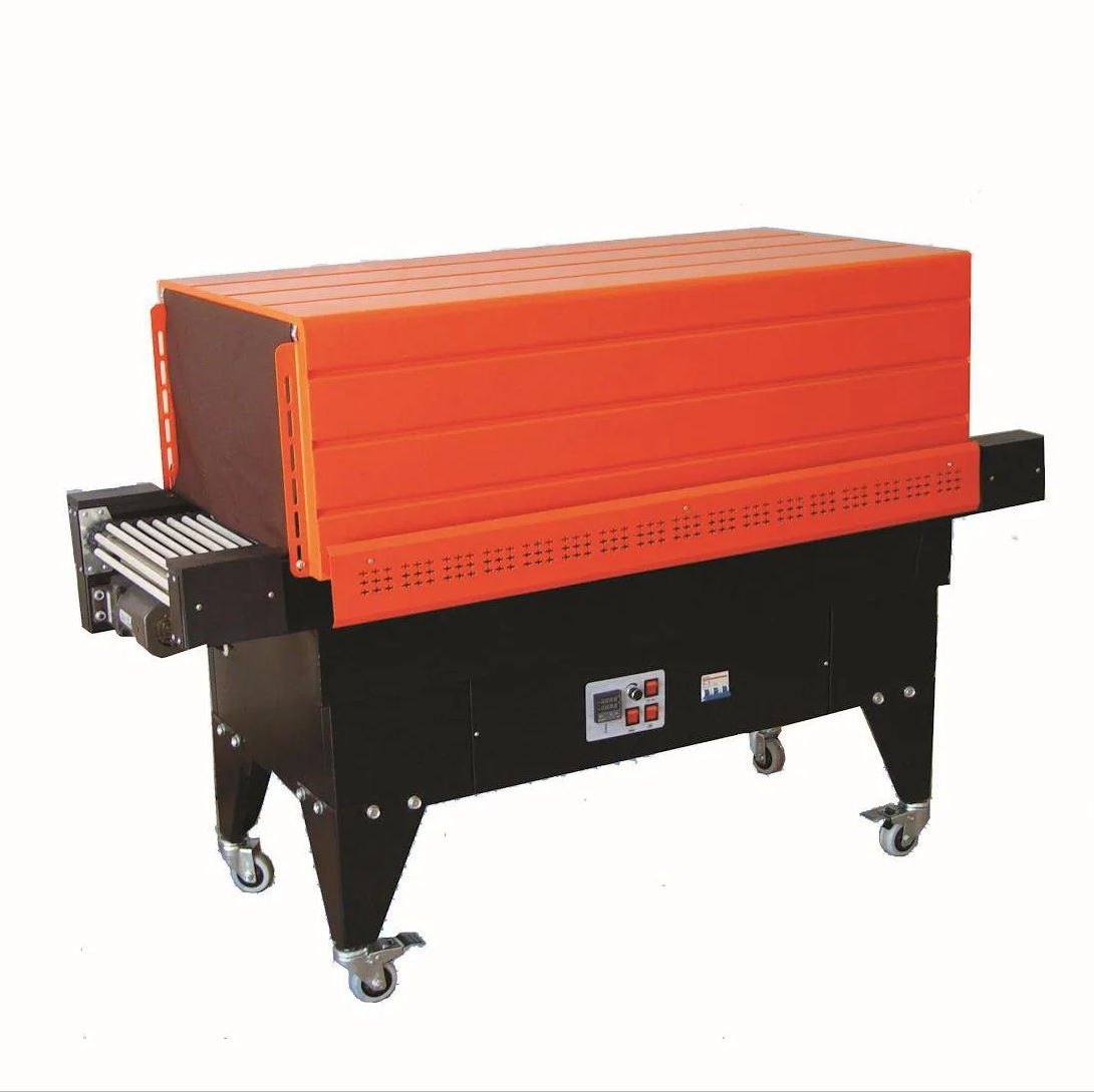 Horno túnel industrial naranja sobre ruedas con base negra.